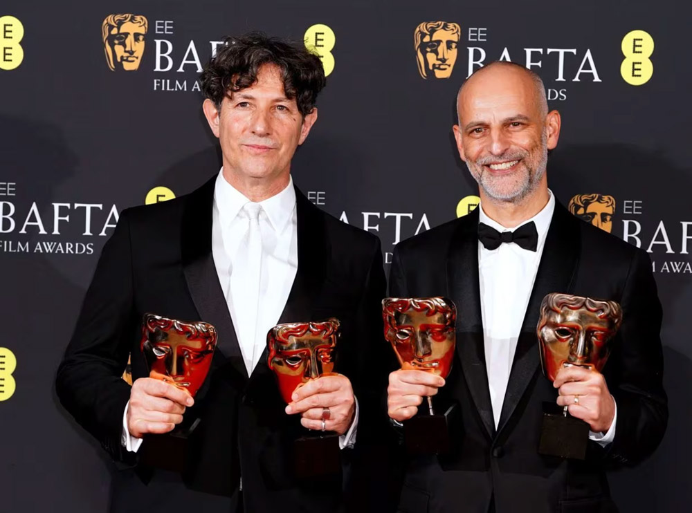 Director Jonathan Glazer and producer James Wilson with their Baftas for The Zone of Interest, which won the Bafta for best British film