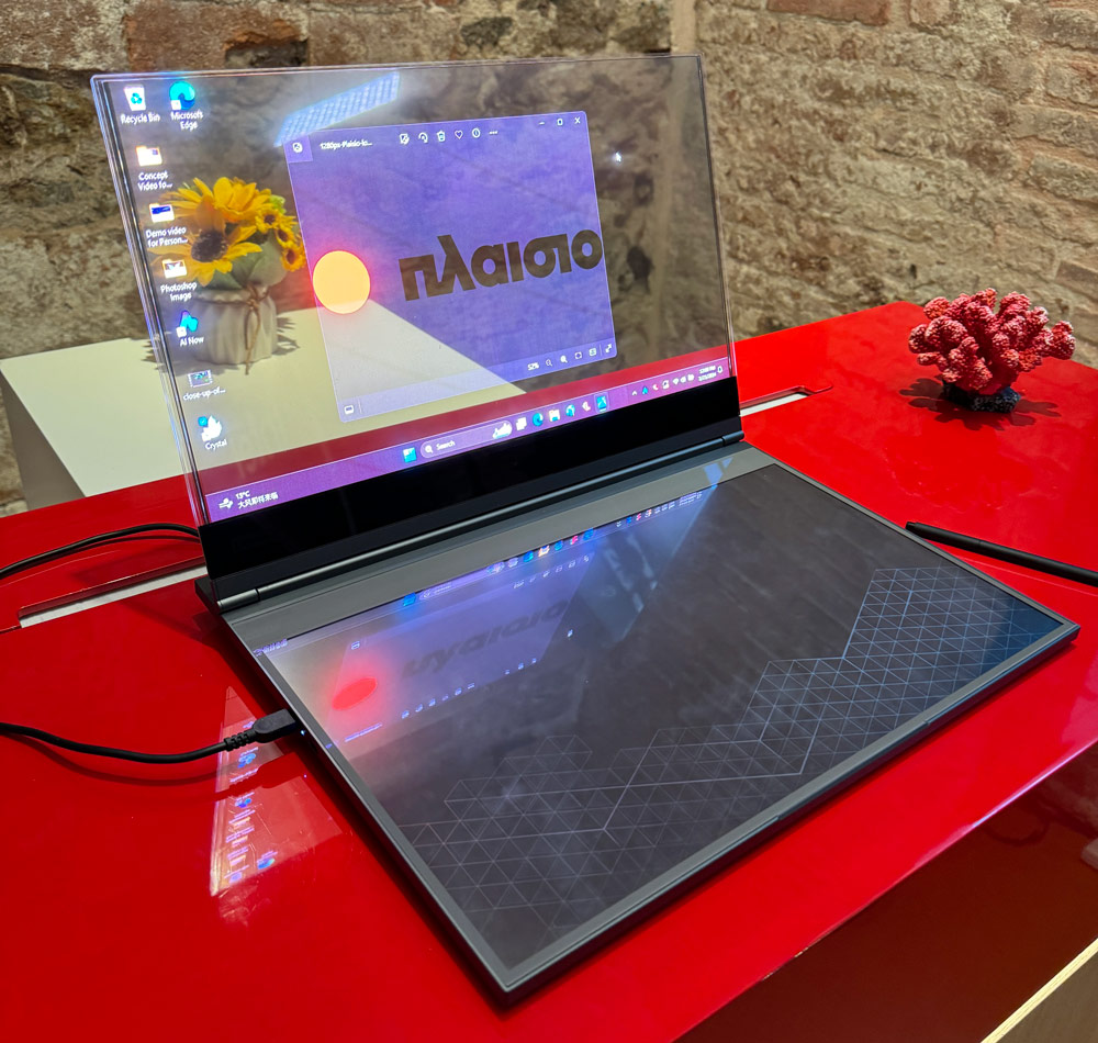 Featuring a borderless screen and a transparent keyboard and footpad, it opens up new possibilities for collaboration and enables the interplay of physical objects and overlaying digital content.