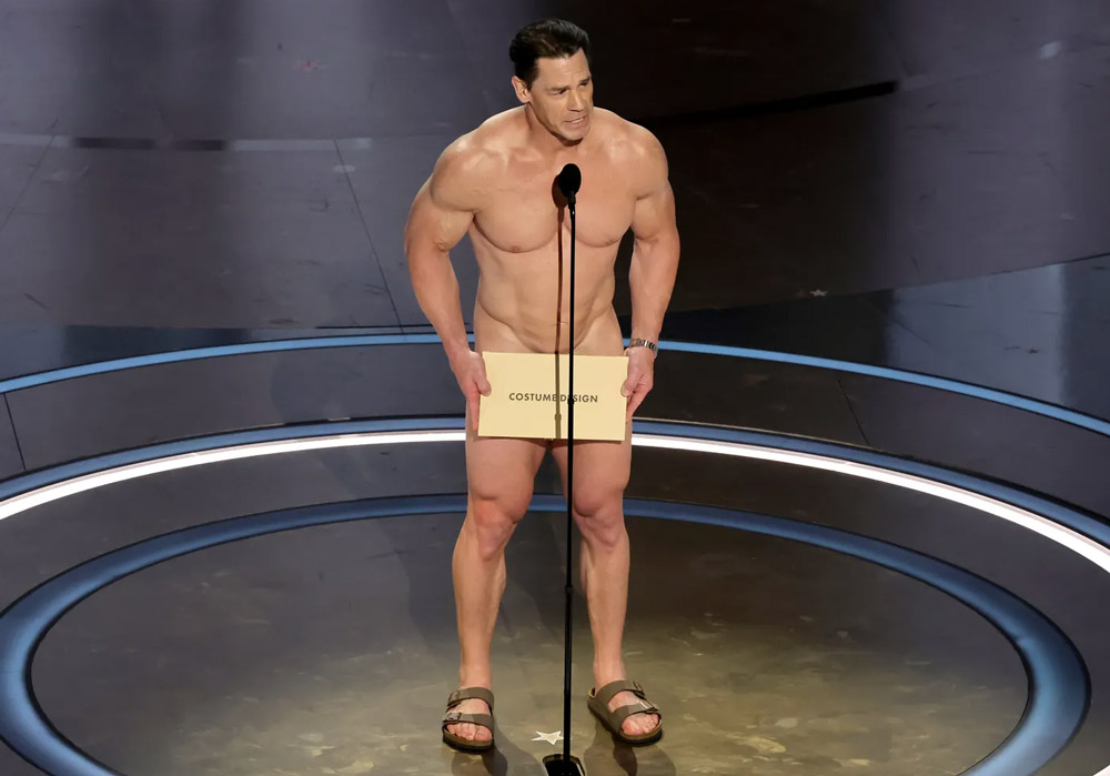 John Cena, naked, presenting Best Costume Design.