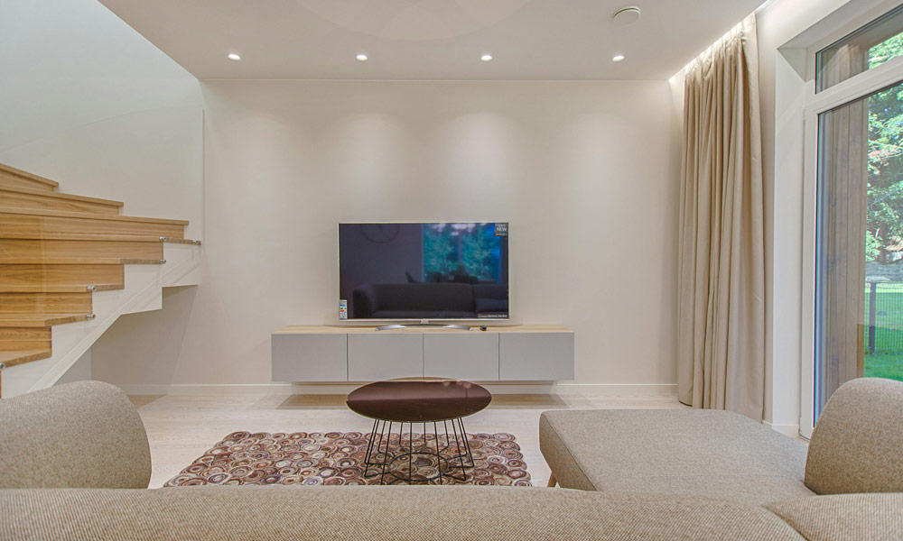 A tv in a minimal living room