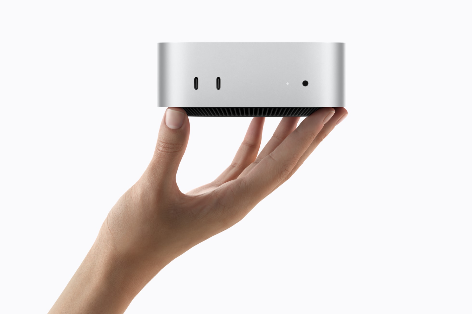 mac mini with a hand
