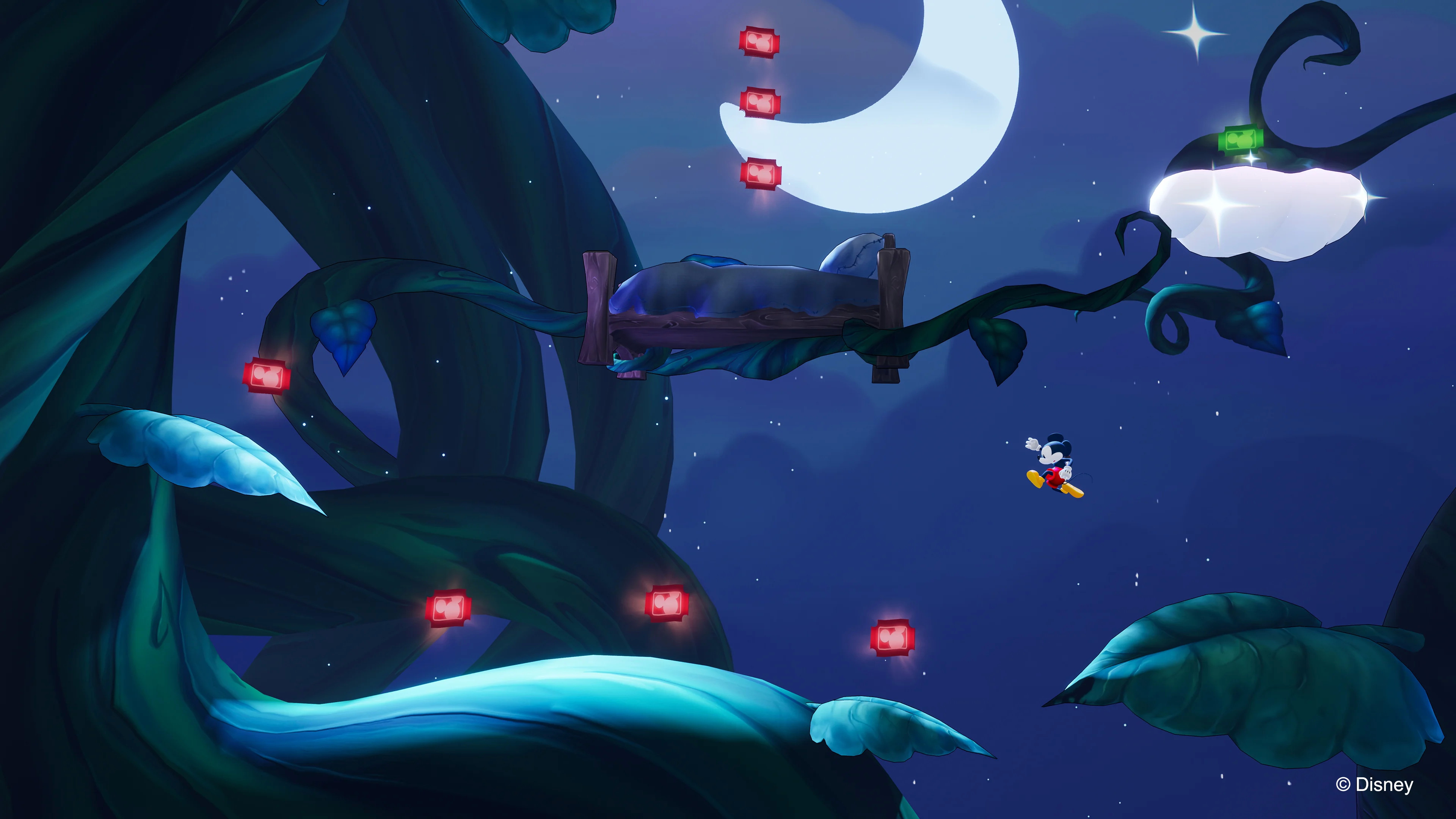 Mickey in a 2D platforming section over vines and leaves