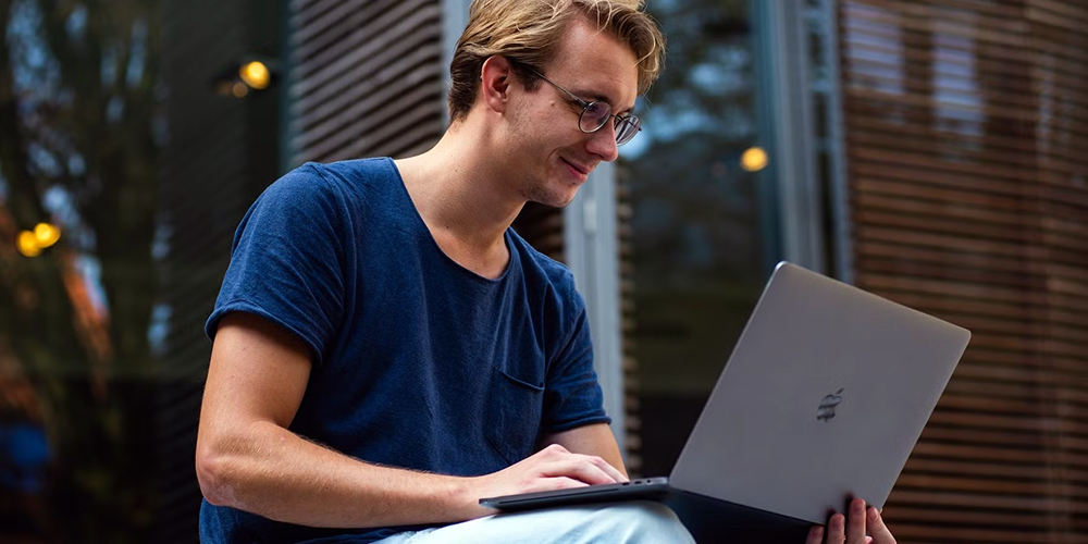 Man Using MacBook Pro