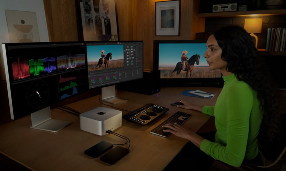 A woman editing a video on a Mac Studio
