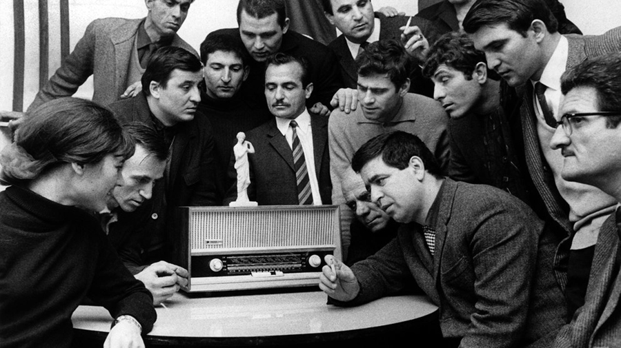 Munich 1967, Greek immigrants listening the Bavarian Greek radio news report 