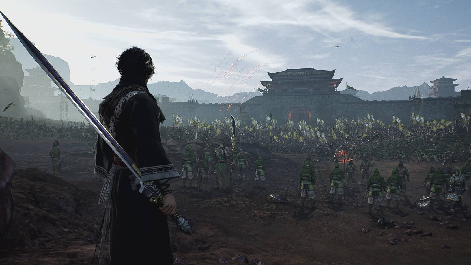 Dynasty Warriors Origins main character overlooking a valley full of military personnell 
