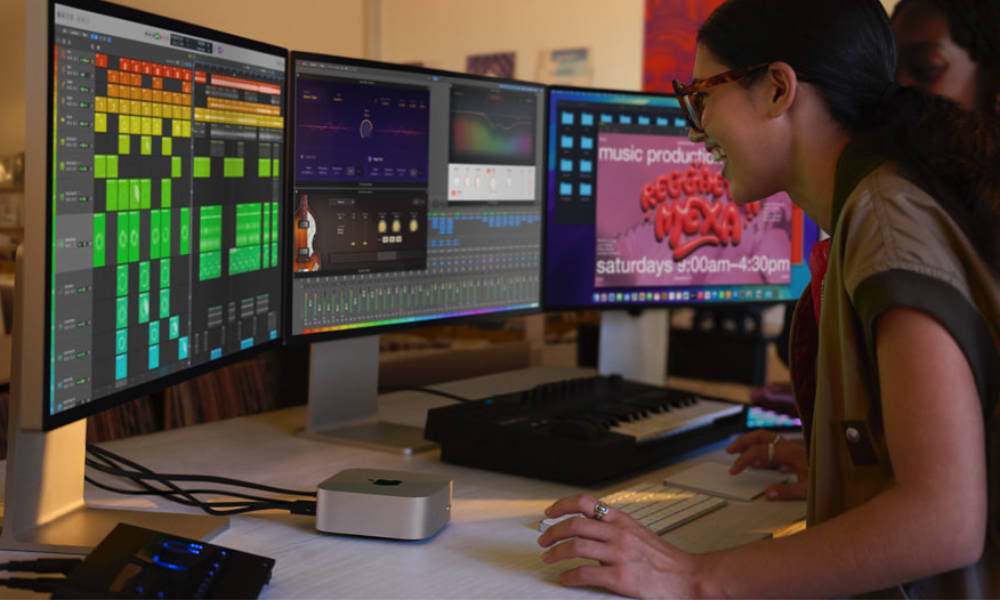 People working enthusiastically with Mac Mini