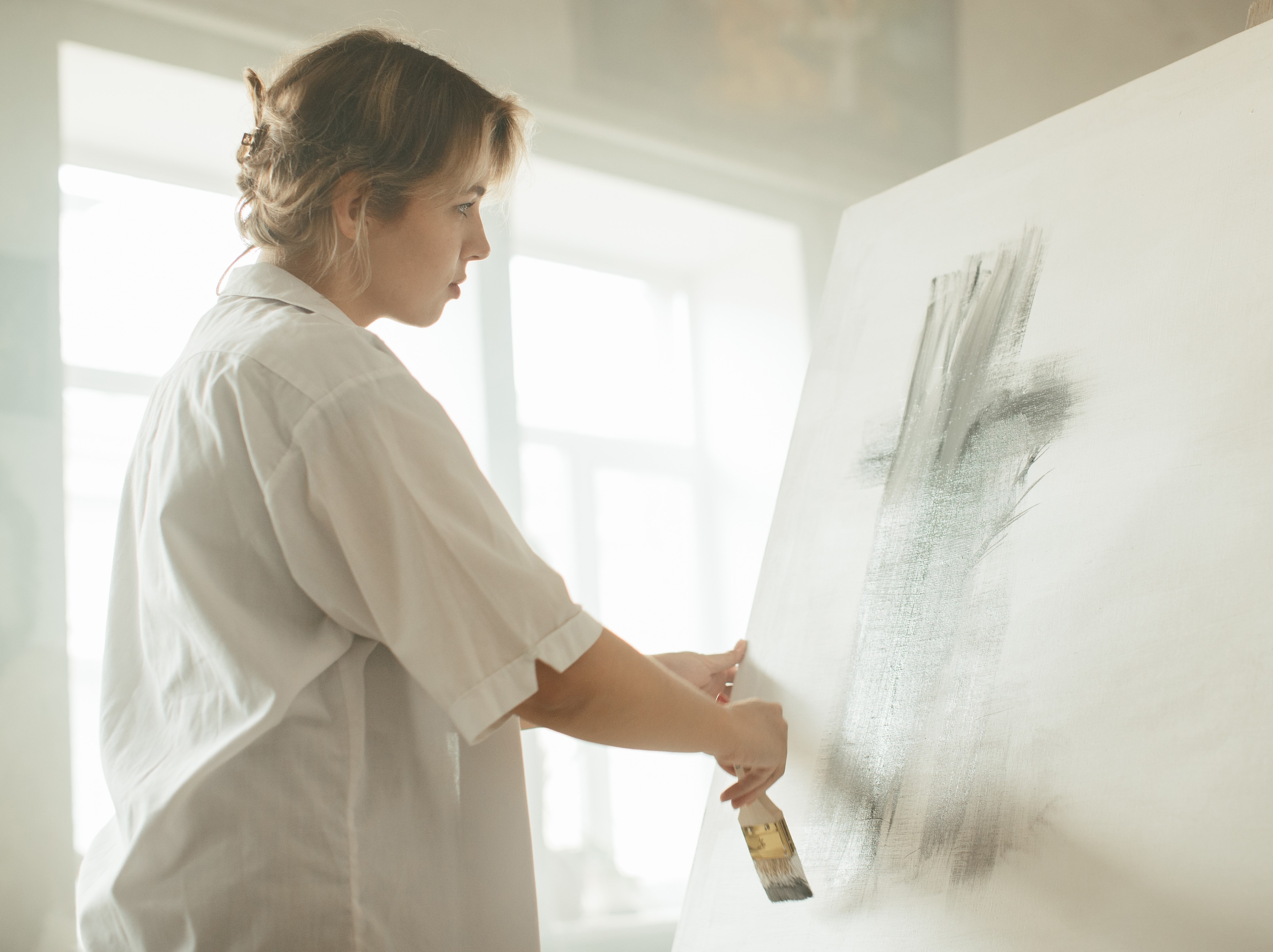 artist brushing