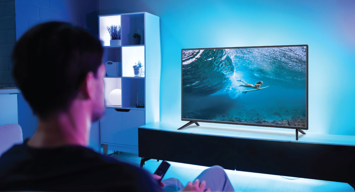 A man watching in a blue room