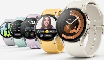 A series of smartwatches in different colors over a white background