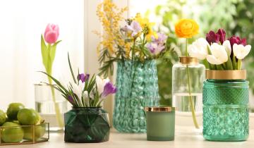 Different,Beautiful,Spring,Flowers,And,Candle,On,Window,Sill