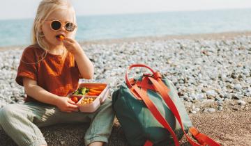 Child,Girl,With,Lunchbox,Eating,Vegetables,Outdoor,Travel,Vacation,Healthy